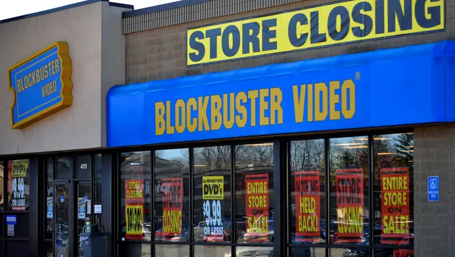 A Blockbuster store closing sign